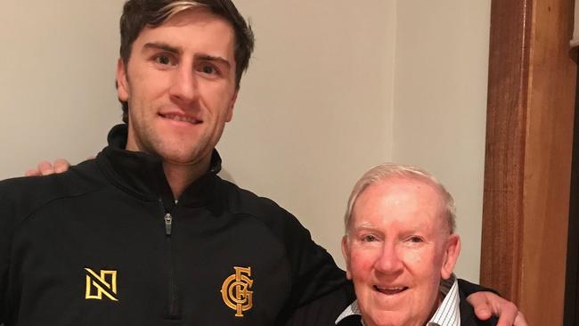 Glenelg captain Max Proud with his grandfather Bob Brinkworth. Picture: Supplied