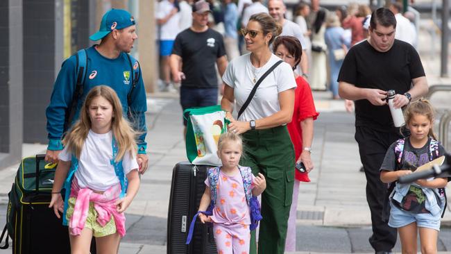 David and Candice Warner step out with their kids in Adelaide. Picture: Media Mode