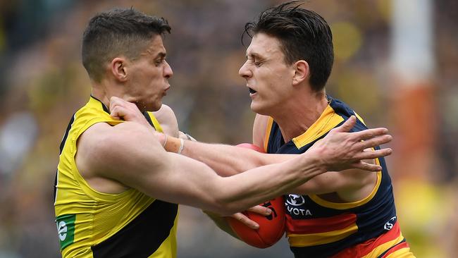 jake Lever tries to fend off Richmond’s Dion Prestia in his last game as a Crow, the 2017 Grand Final.