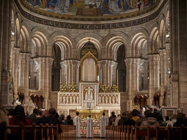 Mass inside Sacre-Coeur Basilica in Montmartre on All Saints Day in Paris, France. Picture: Getty Images