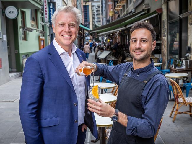 Lord mayoral candidate Arron Wood is joined by Miguel Ramirez from Kirks Wine Bar in Hardware Lane. Picture: Jake Nowakowski