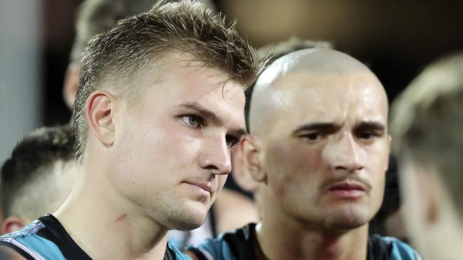 Port Adelaide’s “Bash Brothers”, vice-captain Ollie Wines, left, and fellow midfielder Sam Powell-Pepper, led the way with contested football in the Power’s 57-point win against the Western Bulldogs at Adelaide Oval on Thursday night. Picture: Sarah Reed.