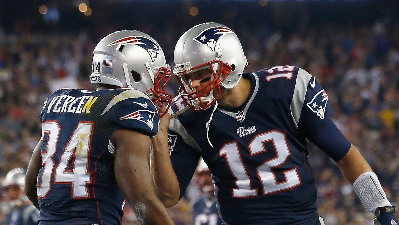 FOXBORO, MA - OCTOBER 16: Shane Vereen #34 and Tom Brady #12 of the New England Patriots react after Vereen scored a touchdown during the second quarter against the New York Jets at Gillette Stadium on October 16, 2014 in Foxboro, Massachusetts. Jim Rogash/Getty Images/AFP == FOR NEWSPAPERS, INTERNET, TELCOS & TELEVISION USE ONLY ==
