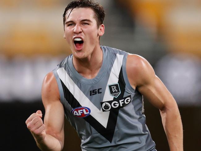 BRISBANE, AUSTRALIA - SEPTEMBER 21: Connor Rozee of the Power celebrates during the 2020 AFL Round 18 match between the Collingwood Magpies and the Port Adelaide Power at The Gabba on September 21, 2020 in Brisbane, Australia. (Photo by Michael Willson/AFL Photos via Getty Images)