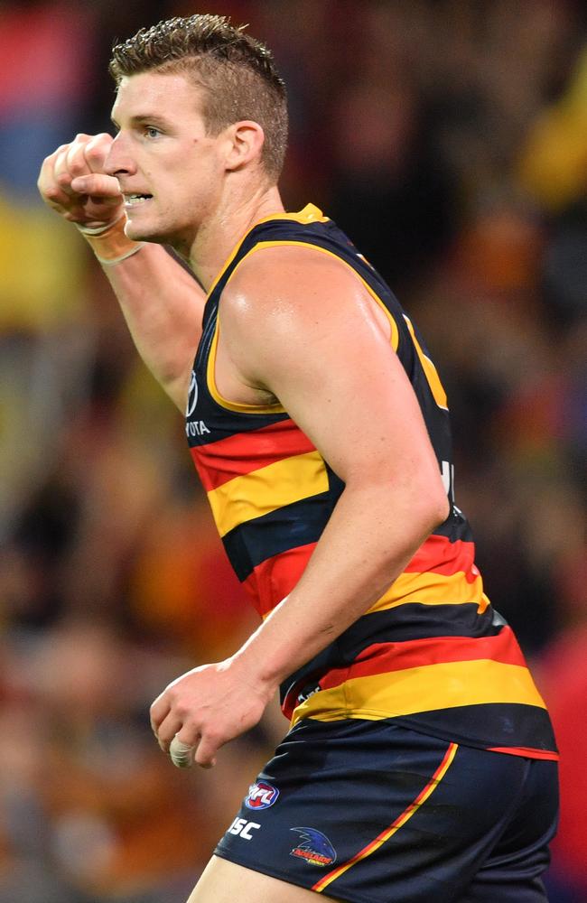 Josh Jenkins of the Crows celebrates a goal during against Richmond.