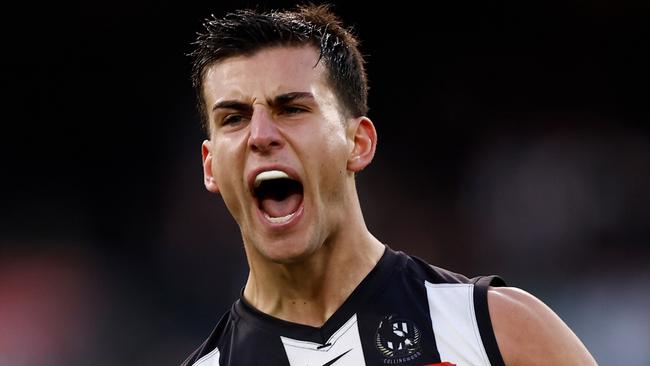 MELBOURNE, AUSTRALIA - AUG 17: Nick Daicos of the Magpies celebrates a goal during the 2024 AFL Round 23 match between the Collingwood Magpies and the Brisbane Lions at The Melbourne Cricket Ground on August 17, 2024 in Melbourne, Australia. (Photo by Michael Willson/AFL Photos via Getty Images)