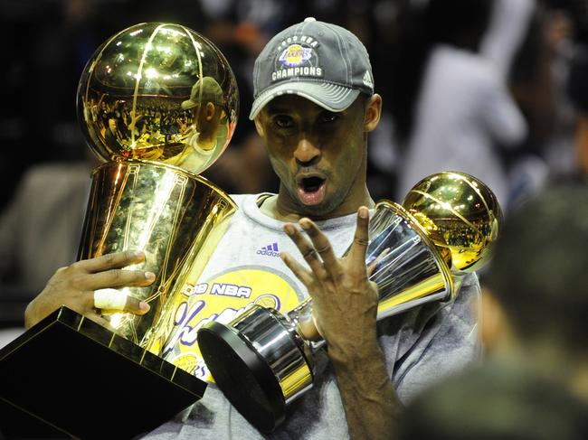 Kobe Bryant of the Los Angeles Lakers celebrates victory following Game 5 of the NBA Finals against the Orlando Magic at Amway Arena in Orlando, Florida on June 14, 2009. Picture: AFP