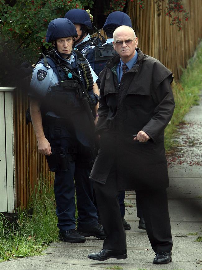 Rowland Legg on the scene of a crime with SOG members.