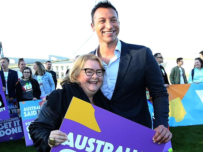 Marriage Equality Ambassadors and volunteers Ian Thorpe, and Magda Szubanski on the Lawns of Parliament House in Canberra. Picture Kym Smith