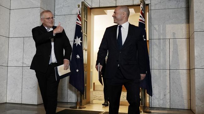 Prime Minister Scott Morrison with Josh Frydenberg after the Treasurer handed down the budget for 2022. Picture: Adam Taylor