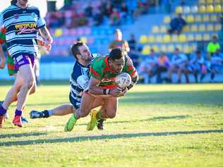 TRY: Ben Otter is unable to stop Logona Vetemotu scoring another try for Hervey Bay Seagulls. Picture: Brian Cassidy