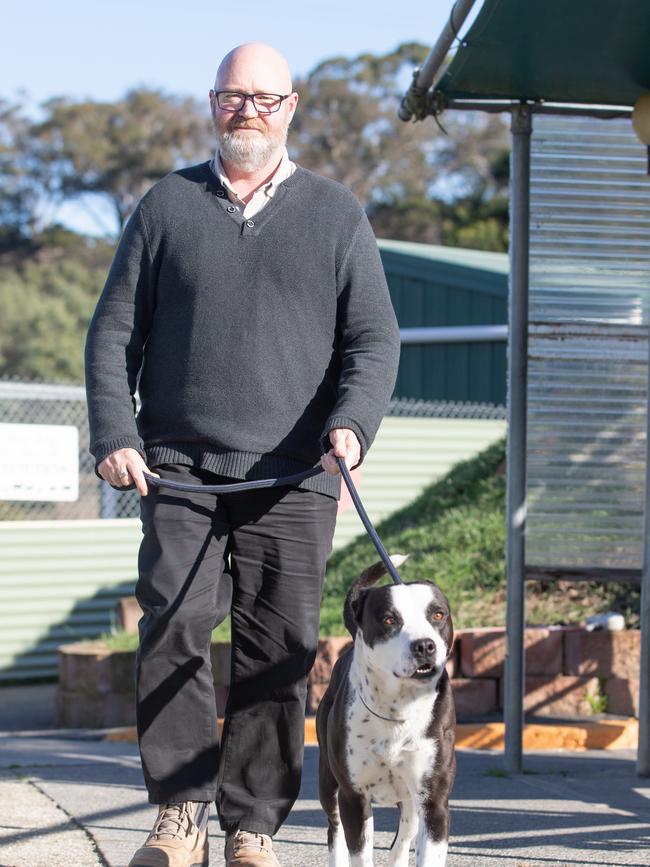 Dogs Home Tasmania chief executive Mark Wild with Sooty, an American Bulldog Kelpie cross who is in need of a home. Picture: Linda Higginson