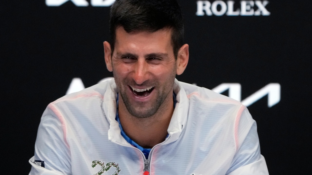 Novak Djokovic wears jacket promoting 22 Grand Slam wins during 10th ...