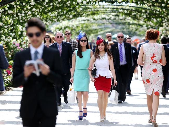 Melbourne Cup Day 2014 at Flemington Racecourse. Punters arrive at the track. Picture: Mark Stewart