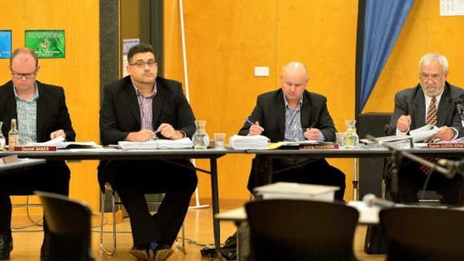 Panel members listen to views from the floor at a meeting last year.