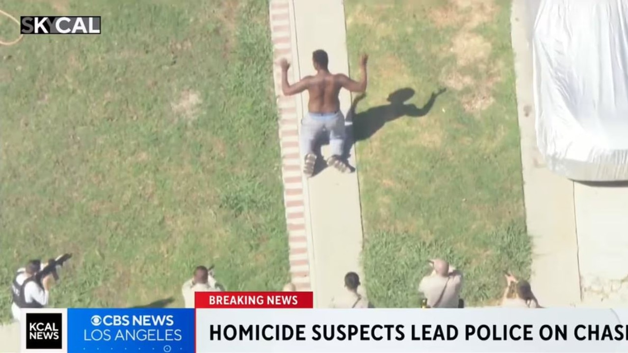 One of the suspects surrounded by police. Picture: CBS News LA