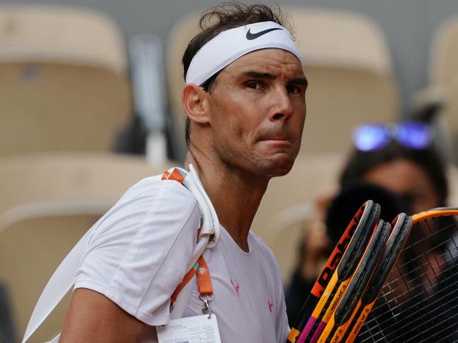 Spain's Rafael Nadal looks on as he leaves the court after taking part in a practice session ahead of The French Open tennis tournament on Court Philippe-Chatrier at The Roland Garros Complex in Paris on May 21, 2024. (Photo by Dimitar DILKOFF / AFP)