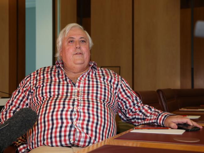 Clive Palmer wore his favourite flanno at a news conference today. Picture: News Corp Australia