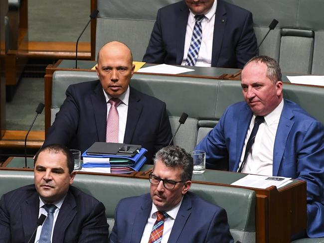 Former Home Affairs Minister Peter Dutton on the backbench with Barnaby Joyce after his first unsucessful challenge. Picture: AAP