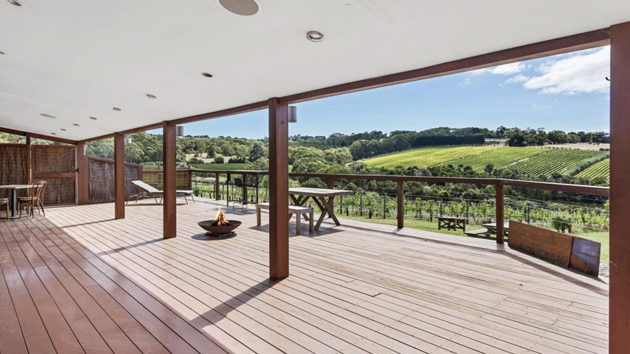 Surrounded by established gardens and rolling hills, the Red Hill home blends vineyard charm with lifestyle flexibility.