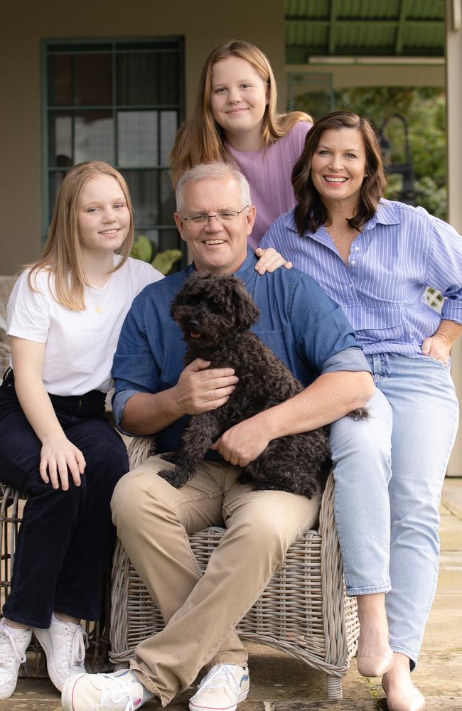 Mr Morrison is relishing the extra time to spend with wife Jenny and their daughters Abbey and Lily — as well as dog Buddy. Picture: Jason Edwards