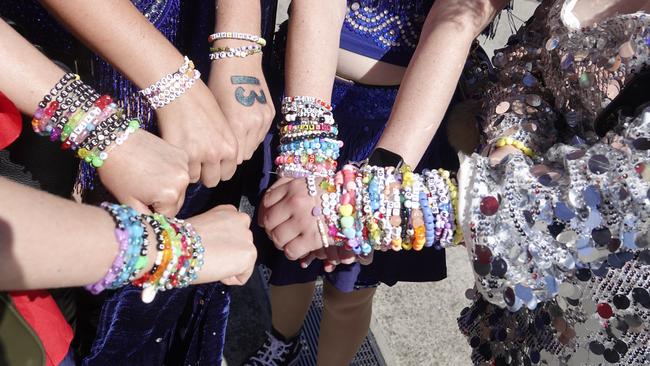 Swifties show off their friendship bracelets ahead of the star’s third concert in Melbourne. Picture: NCA NewsWire/Valeriu Campan