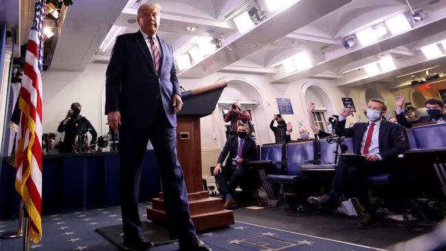 US President Donald Trump leaves a news conference at the White House on Friday. Picture: Reuters