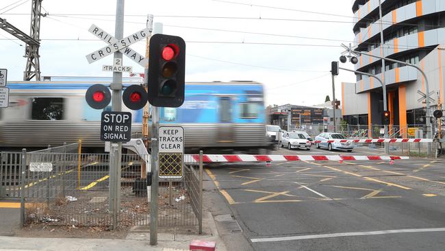 By the end of May more than 60 of the government’s level crossing removals will have been completed. Picture: Hamish Blair