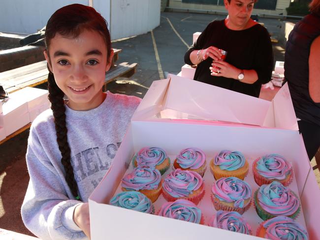 Talented Zoe Gizariotis, 11, created these cup cakes to raise funds for her school. Picture: AAP Image/Mark Scott