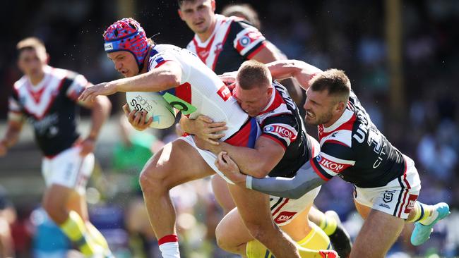 Kalyn Ponga drags the Roosters’ defence along with him at the SCG. Picture: Matt King/Getty Images