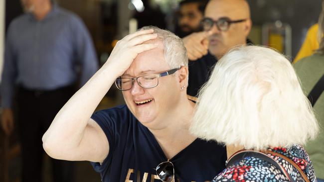 A fan is overcome with emotion after seeing Paul McCartney leaving the Stamford Hotel. Picture: Richard Walker