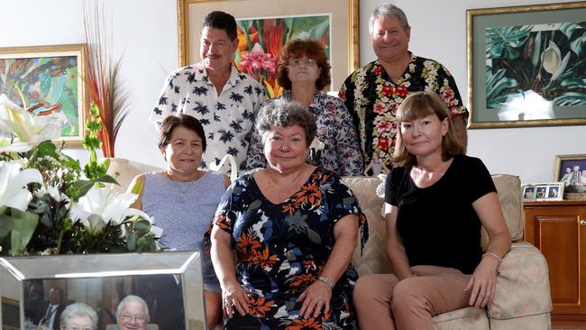 Lou Piccone's children clockwise from back left – John Piccone, Lisa Hitchings, Peter Piccone, Pauline Piccone, Christina Piccone and Marie Giddens at the Edmonton family home with a photo of their late parents Elaine and Lou. PICTURE: STEWART McLEAN.