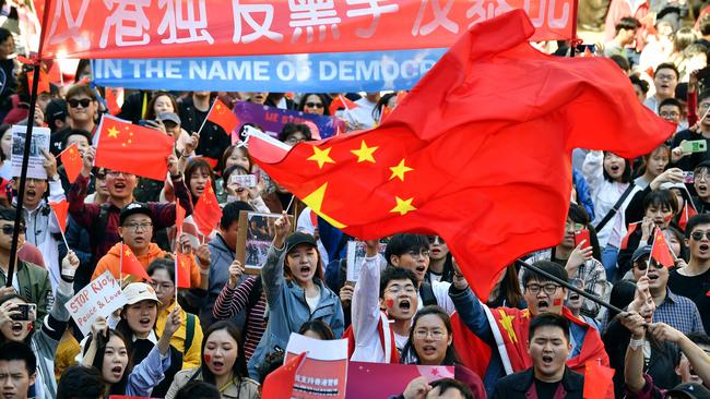 Pro-China activists march on the streets of Sydney in 2019. Picture: AFP