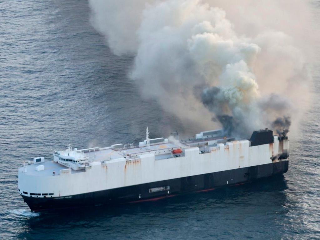 Smoke rises from cargo vessel Morning Midas. Picture: U.S. Coast Guard.