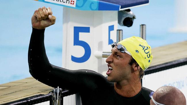 Ian Thorpe celebrates after winning the men's final of 400 freestyle at the 2004 Athens Olympics.