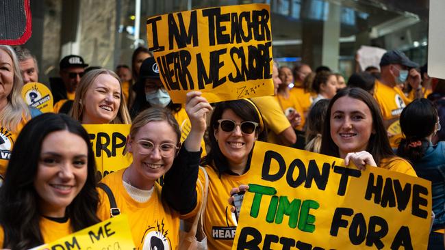 Teachers are seen protesting outside Commonwealth Bank headquarters in Liverpool Street, Sydney. Picture: NCA NewsWire / Flavio Brancaleone