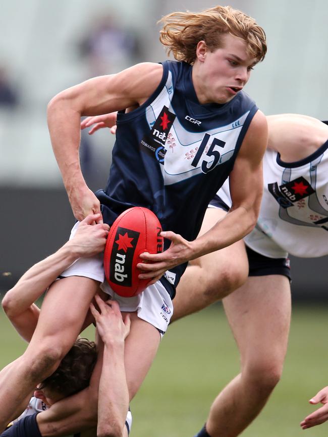 Smith tries to break a tackle against Vic Country earlier this year. Pic: Michael Klein