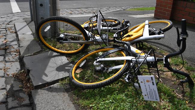 Two oBikes dumped on a North Melbourne footpath. Pic: AAP