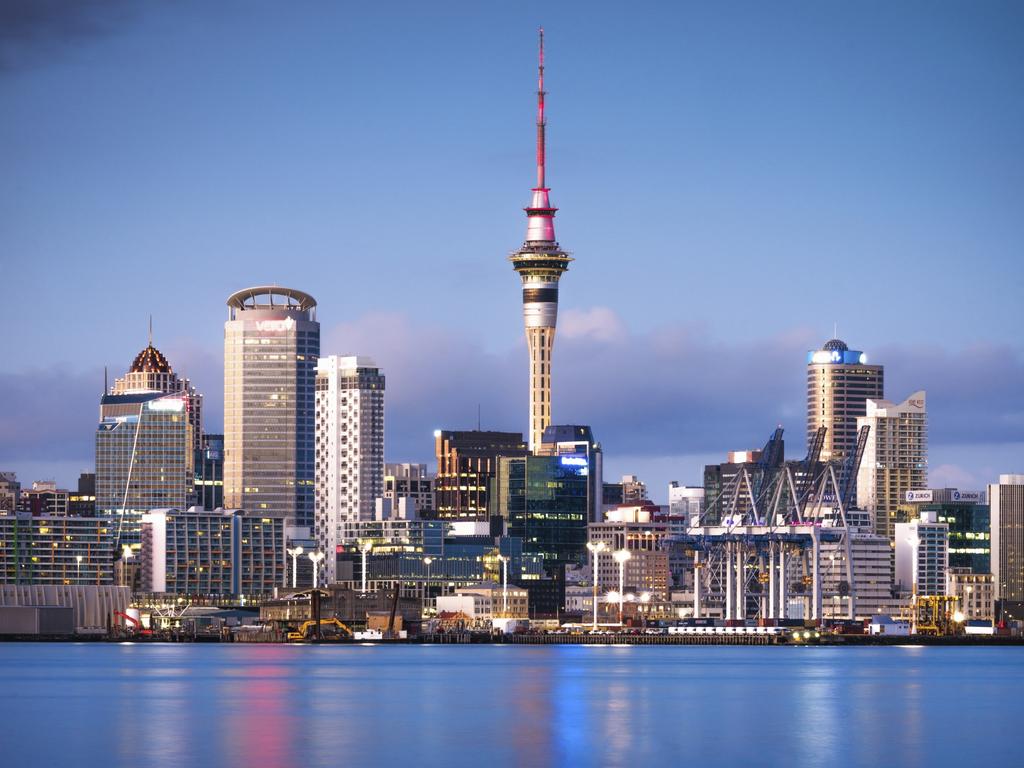 Auckland's CBD seen from across the water at dawn, with the Sky Tower in the centre. Picture: iStock