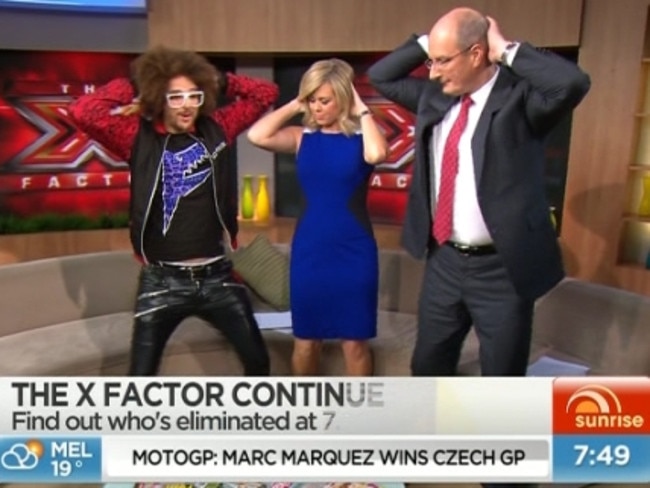 Learning how to wiggle with Redfoo and Kochie on the set of sunrise.