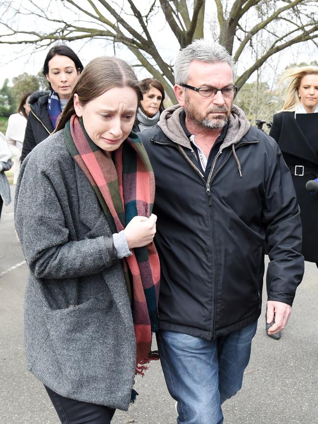 Borce Ristevski and his daughter Sarah leave a press conference. Picture: AAP Image/Tracey Nearmy