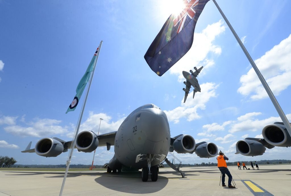 The final C-17 in the RAAF fleet (on ground) during a flyover ceremony to mark the occasion at RAAf Base Amberley on Wednesday. Photo: Rob Williams / The Queensland Times. Picture: Rob Williams