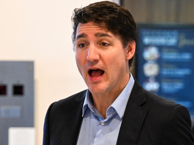 Canadian Prime Minister Justin Trudeau leaves the hotel for the airport, in West Palm Beach, Florida, on November 30, 2024. Canadian Prime Minister Justin Trudeau arrived in Florida on November 29 for a dinner with Donald Trump at the president-elect's Mar-a-Lago estate, as the incoming US leader promised tariffs on Canadian imports. The unannounced meeting comes at the end of a week that has seen Canada as well as Mexico scramble to blunt the impact of Trump's trade threats, which experts have warned could also hit US consumers hard. (Photo by CHANDAN KHANNA / AFP)