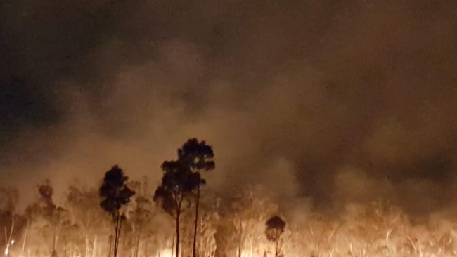 A crew from Tieri Fire and Rescue helped fight this fire along Lake Mary Road, outside of Yeppoon, on Monday morning. Picture: Stacey Barry