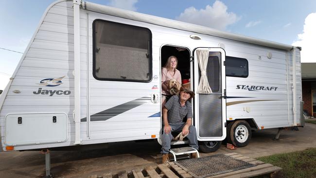 Rochester flood victims Michael Speight and his daughter Belinda with dog Banjo, now live in caravans. Picture: David Caird