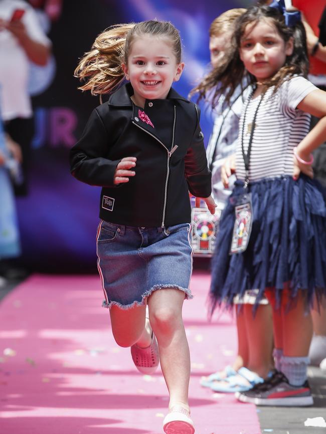 Candice and David Warner's daughter Ivy Mae Warner in the fashion show at Trolls event. Picture: Dylan Robinson