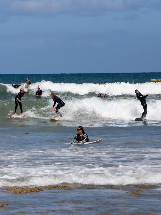 Surfers at the paddle out. Picture: Brett Hartwig