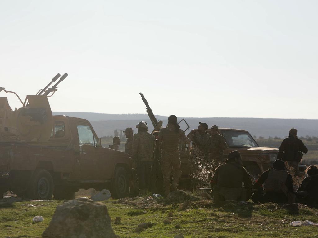 Turkish-backed groups take a position near Tal Rifaat. Picture: Bakr Alkasem/AFP