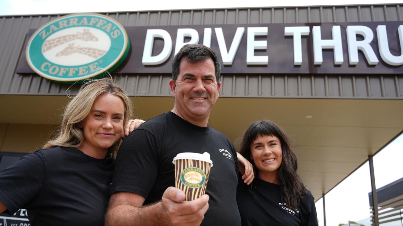 Zarraffa's Coffee Toowoomba franchisee Damian Doyle (pictured with daughters Taylor Butler and Jordan Koina) will open his relocated Newtown drive-through shop south along Anzac Avenue, next to Oporto.