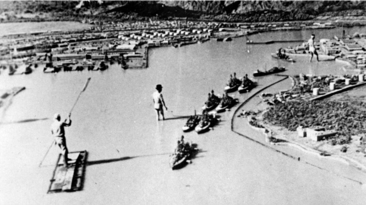 Japanese naval personnel prepare a scale-model mock-up of “battleship row” at the United States Naval base of Pearl Harbor in preparation for the surprise attack in 1941. Source: Wikimedia.